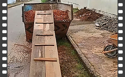 Caçamba estacionária utilizada para descarte de entulho em obras e reformas